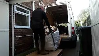 Fred delivering logs with his home made wooden ramp