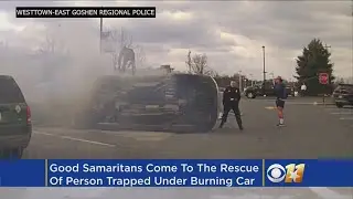 Dash Cam Video: Good Samaritans Rescue Person Trapped Under Burning Car