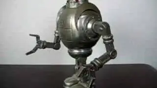 ZATHURA tin toy robot by Schylling
