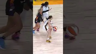 Caitlin Clark drives on Sophie Cunningham for the score