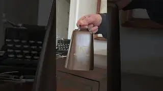 Solid Brass Cow Bell Being Rung
