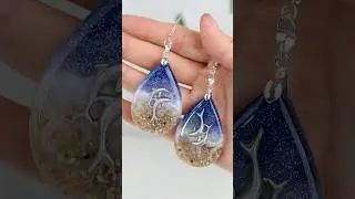 ✨ Crystal-clear UV resin pendants, made with sand and glitter