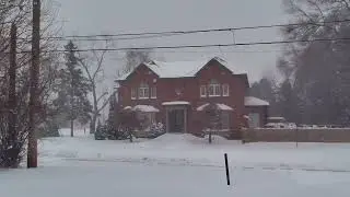 Snow plow passing Toronto residential area. 2026 Jan 25