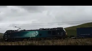 TESCO FREIGHT TRAIN AT HIGH SPEED WEST COAST MAIN LINE