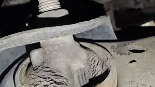 Both control arm bushings look torn....