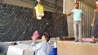 Loading of River Black Granite