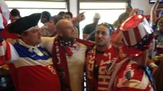 American soccer fans sing God Bless the USA after advancing in World Cup