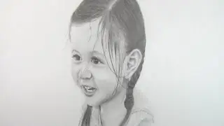 Pencil Portrait of my Grandaughter by Geoff Reynolds