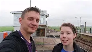 Couple spend the summer travelling to railway stations