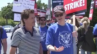 Actor Rob Lowe joins writers' strike picket line
