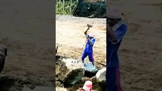 Working daily as a manual stone breaker