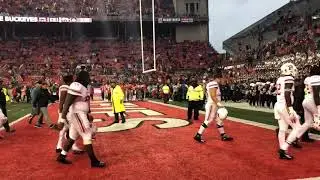 Rutgers QB Artur Sitkowski walks off field