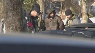 Armed fugitive arrested after hour-long Akron SWAT standoff and house fire