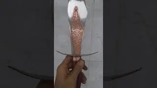 Espada com s&iacute;mbolos de Ians&atilde; Oya