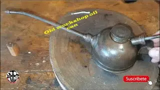 Antique metal workshop oil can