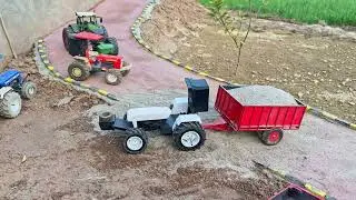 Самодельный радиоуправляемый трактор New Holland 4X4 из моей коллекции всех моделей тракторов с п...