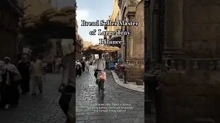 Incredible Balance: Egypt's Cycling Bread Vendor