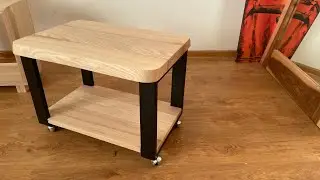 wooden table on a metal support