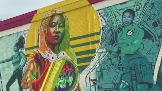 Chicago artist unveils massive mural in Bronzeville to celebrate Juneteenth