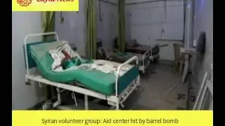 Syrian volunteer group: Aid center hit by barrel bomb |  By : CNN
