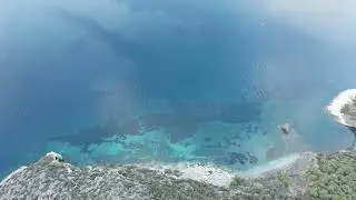 Stunning Greek Coastline from Above: Peaceful Aerial Journey