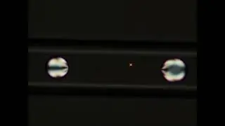Collison between two self propelled nematic liquid crystal droplets in a microcapillary