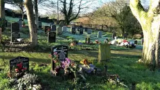 Uffculme, Devon, UK: A view of the Cemetery, Church and Churchyard and the memorials.
