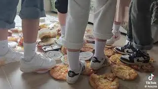 Girl's trample pizza