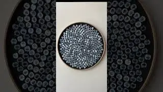 Fibonacci Rain Moving Mosaic made from Aluminum Cans