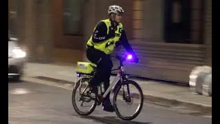 City of London Police - Bike Squad responding with red and blue lights in the City of London