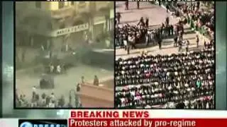 Christians protecting Muslims during their prayers in Tahrir Square