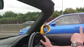 Honda S2000 encounters a Nissan Skyline R34 GT-R Nur Spec