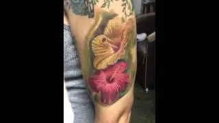 Flower tattoo by Carlos Ortiz at Aztek Ink in blue island Illinois