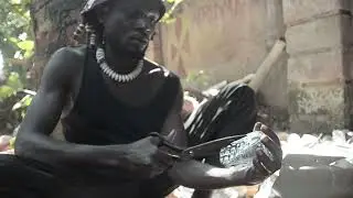 Uganda. Street Flash Mop: Turning Plastic Waste into Wearable Art for Climate Action