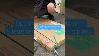 Opening a James Martin countertop box by Silestone with a Milwaukee demolition screwdriver.