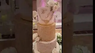 Gold and blush sequin wedding cake.