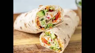  Hummus, stuffed with crisp lettuce, juicy tomatoes, cucumber, and shredded carrots. Light, fresh.