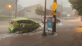 Chevy Spark EV in heavy downpour and flooding