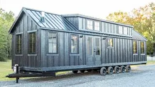 Exceptionally Cozy Bunkhouse Tiny House Model by Timbercraft Tiny Homes