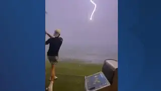 Lightning strike hits golf ball in mid-air