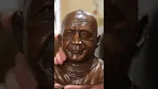 Knute Rockne, legendary coach of the Notre Dame Fighting Irish.  Sculptor Paul Kamish.