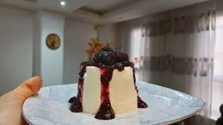 Panna cotta with black berry sauce