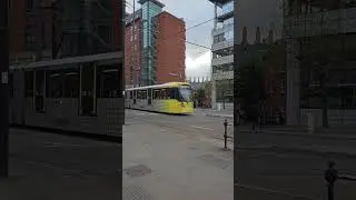 Metrolink trams 3130 and 3124 passing Manchester Central