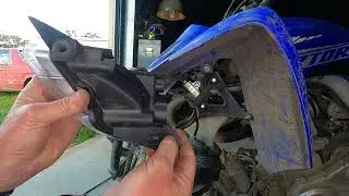 Replacing the broken headlight on a 2020 Raptor 700R