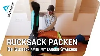 Rucksack packen bei Gleitschirmen mit langen St&auml;bchen