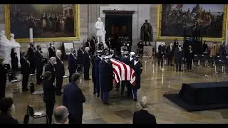 Harry Reid lies in state at the U S  Capitol