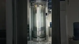 ROUND CIRCULAR CENTER OPENING GLASS  LIFT  BY RSP ELEVATORS CHENNAI 9380612661