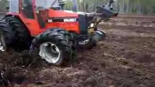 Valmet 705 clearing old forest to a field
