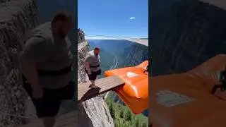 Orange Cliff airbag is Wild! 😱🔥 Guy jumps, girl flies! #ScaryRide #TravelWonderGuy