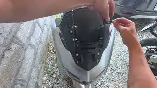 Installing the X3 windshield bracket on the NMAX